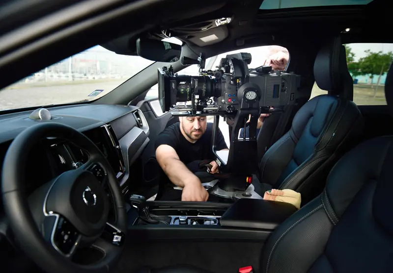 ARRI SRH-3 on a camera car, crew rigging inside the car