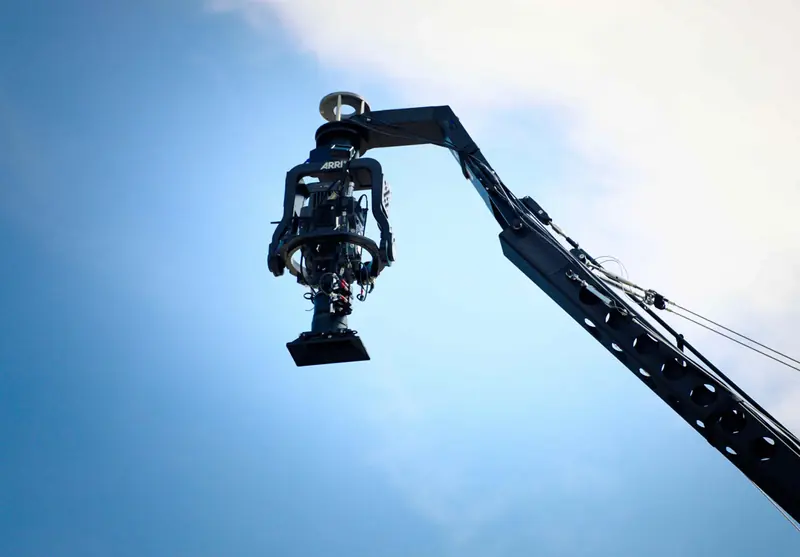 ARRI SRH-3 on a crane arm against the sky