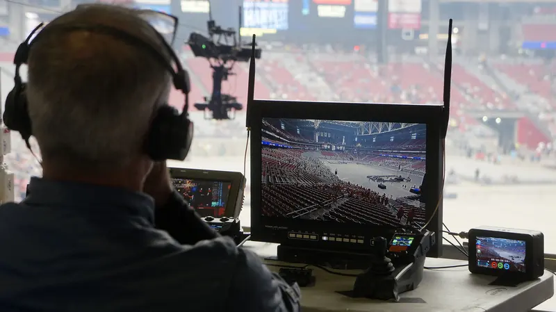 Cable cam operator at a monitor during a live event