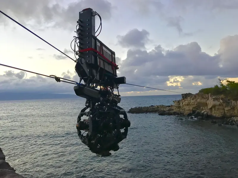 Dactylcam Pro cable cam over the sea at sunset