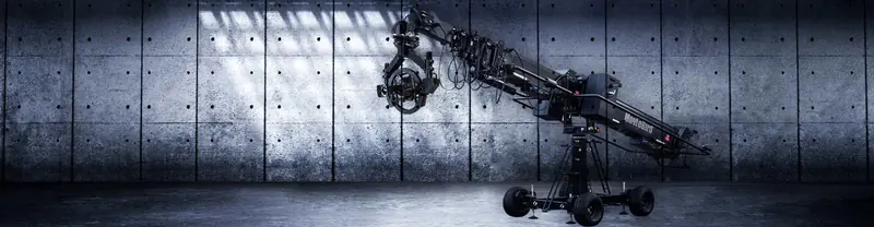 MovieBird 45 techno crane with a remote head in front of a concrete wall
