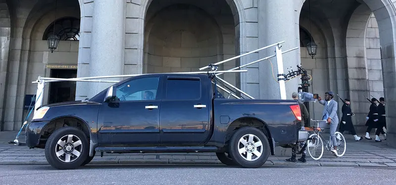 Newton stabilized remote head on a car arm in the city