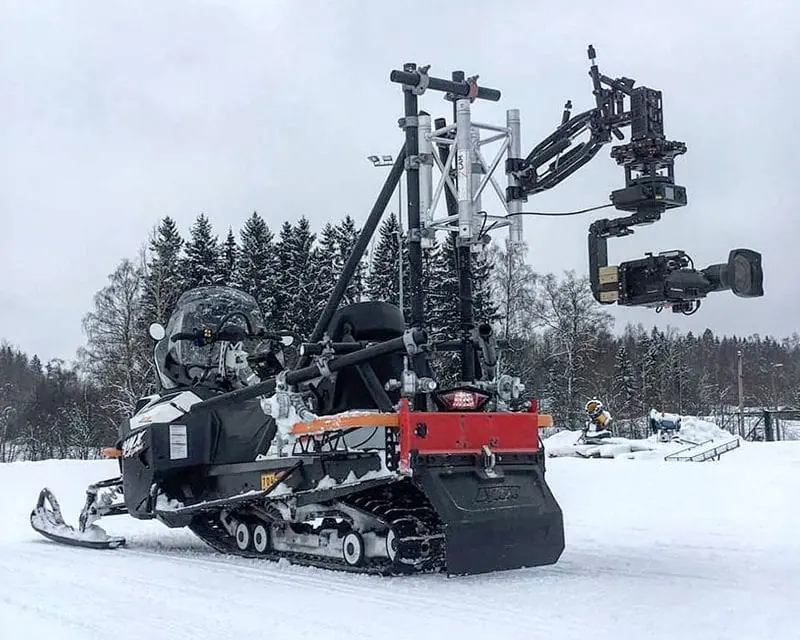 Newton stabilized remote head on a snowmobile