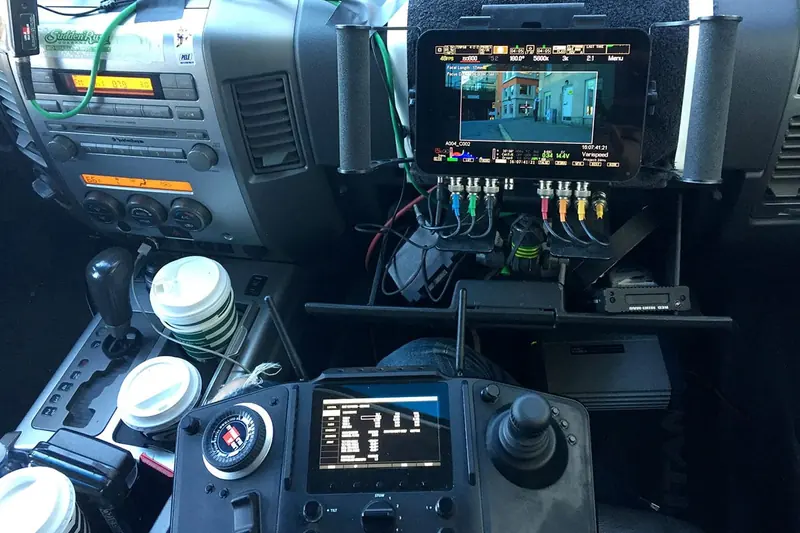 Operator with a Newton camera car rig, BIKEID shoot